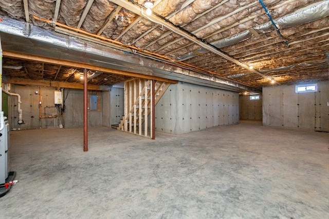 basement featuring electric panel