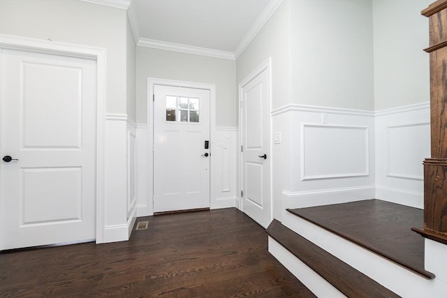 entryway featuring dark hardwood / wood-style flooring and crown molding