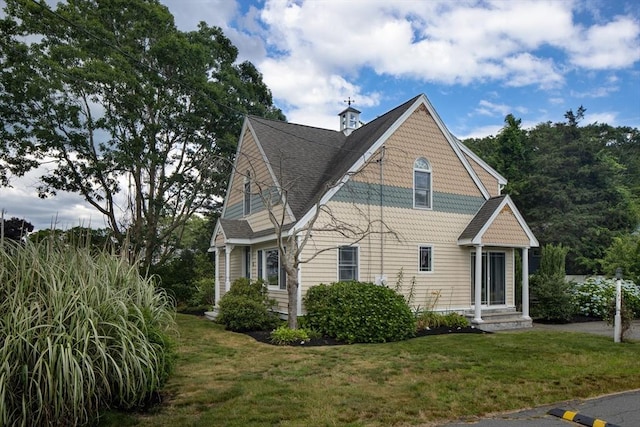 view of home's exterior featuring a lawn