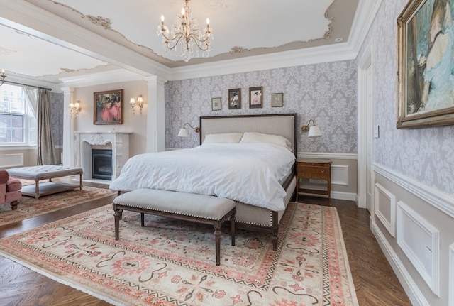 bedroom featuring dark parquet flooring, crown molding, and a chandelier