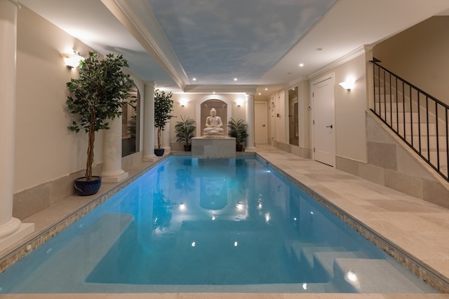 view of swimming pool featuring a jacuzzi