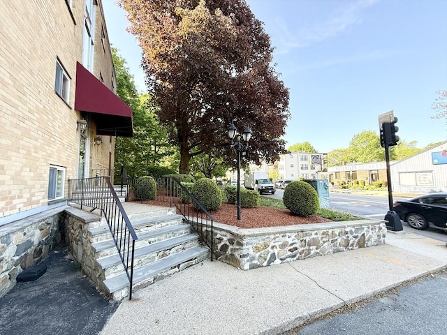 135 Granite Ave Unit 23, Boston, MA 02124 - view of yard featuring a residential view