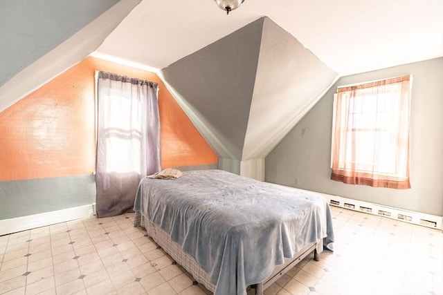 bedroom featuring vaulted ceiling