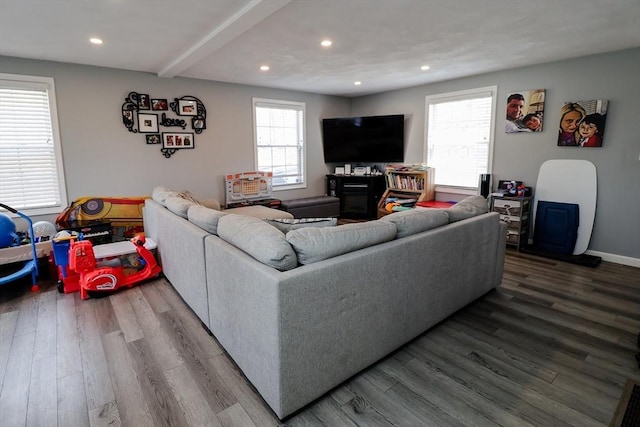 living area with recessed lighting and wood finished floors