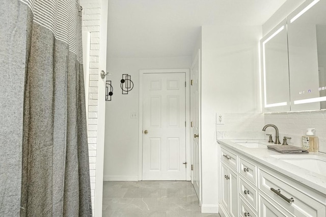 1 Cherry Tree Ln, Plainville, MA 02762 - full bath featuring double vanity and tasteful backsplash