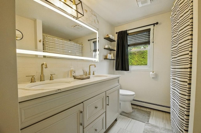 1 Cherry Tree Ln, Plainville, MA 02762 - bathroom featuring a baseboard heating unit, double vanity, decorative backsplash, and a shower with shower curtain