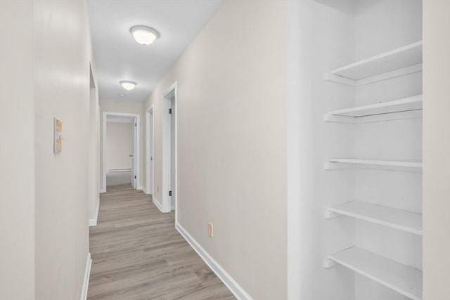 hallway featuring light hardwood / wood-style flooring