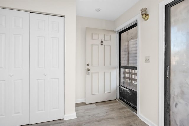 foyer entrance featuring light hardwood / wood-style floors