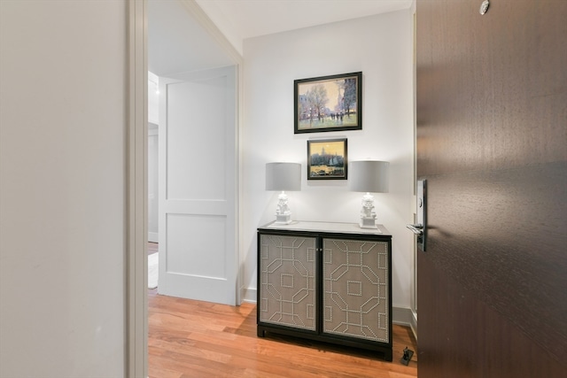 hall featuring light hardwood / wood-style floors