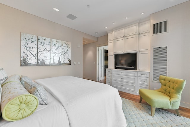 bedroom featuring light hardwood / wood-style flooring