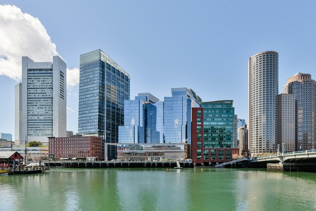 property's view of city with a water view