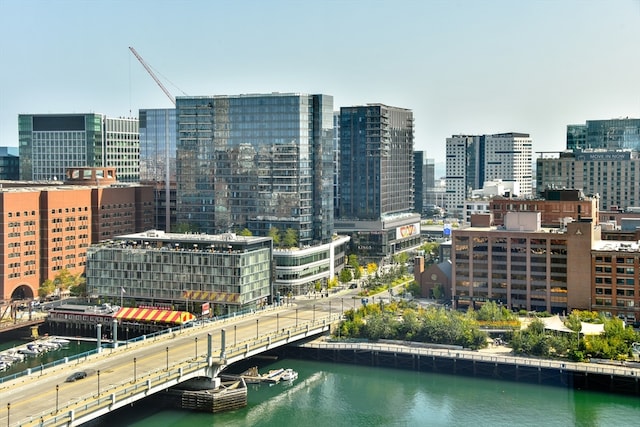 property's view of city with a water view