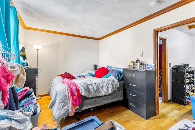21 Hillside Ave Unit 21, Everett, MA 02149 - bedroom with ornamental molding and wood finished floors