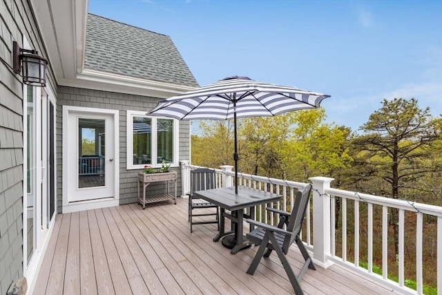 deck featuring outdoor dining area