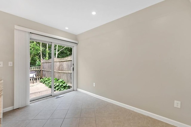 83 Jamestown Dr Unit 83, Springfield, MA 01108 - empty room featuring baseboards, light tile patterned floors, and recessed lighting