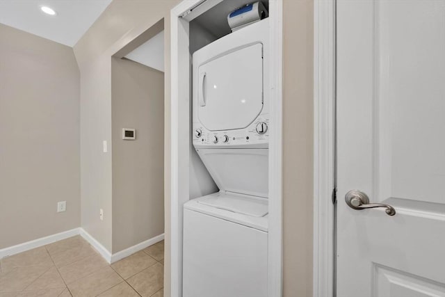 83 Jamestown Dr Unit 83, Springfield, MA 01108 - laundry room featuring stacked washer and clothes dryer, light tile patterned flooring, baseboards, and recessed lighting