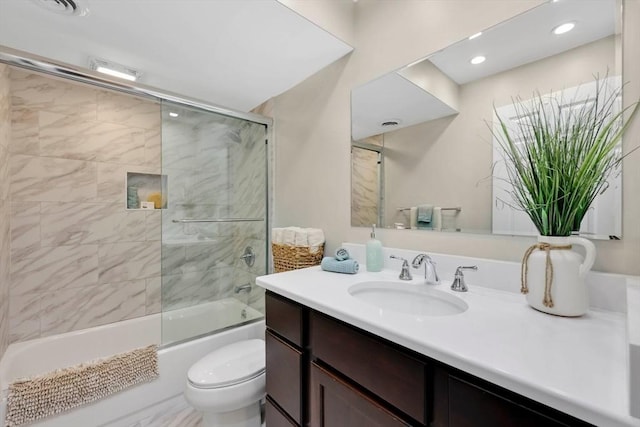 83 Jamestown Dr Unit 83, Springfield, MA 01108 - bathroom featuring vanity, toilet, bath / shower combo with glass door, and recessed lighting