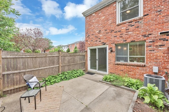 83 Jamestown Dr Unit 83, Springfield, MA 01108 - fenced backyard with a patio area and central air condition unit