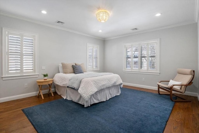 bedroom featuring dark wood-style floors, baseboards, and visible vents