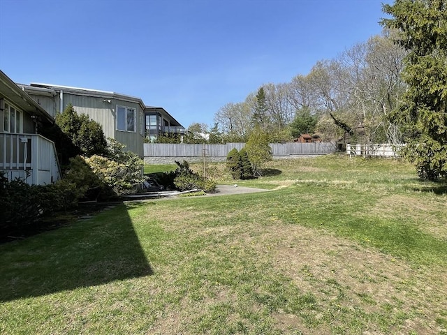 view of yard featuring fence