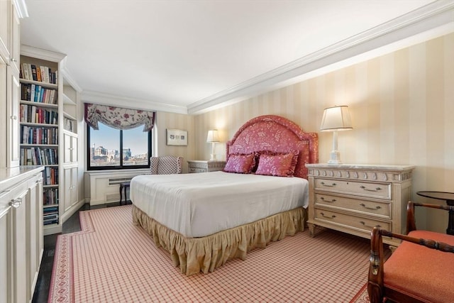 bedroom featuring crown molding and light colored carpet