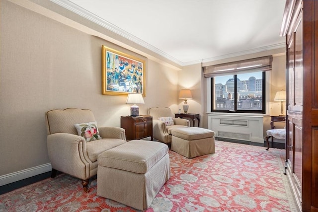 sitting room featuring ornamental molding