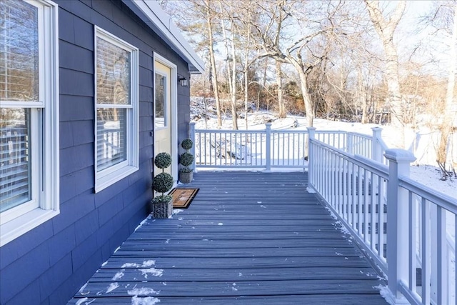 view of snow covered deck