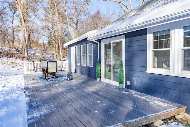 view of snow covered deck