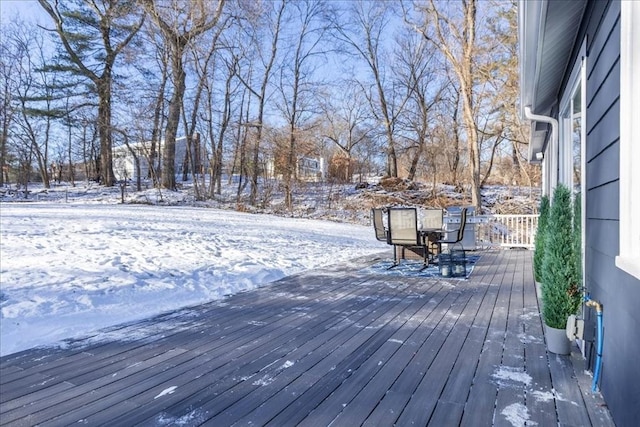 view of snow covered deck