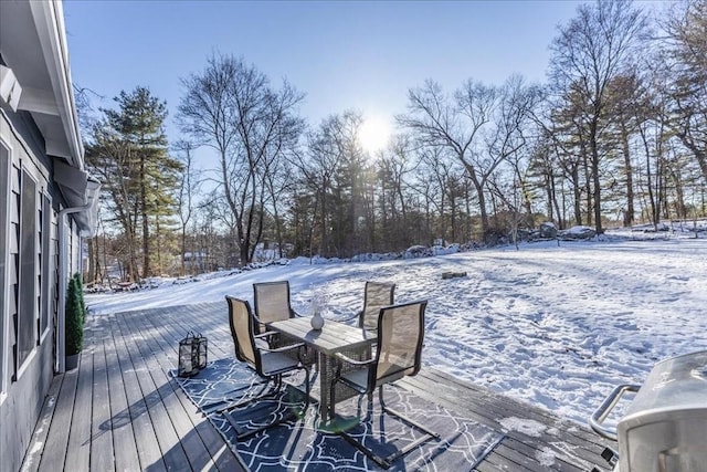 view of snow covered deck