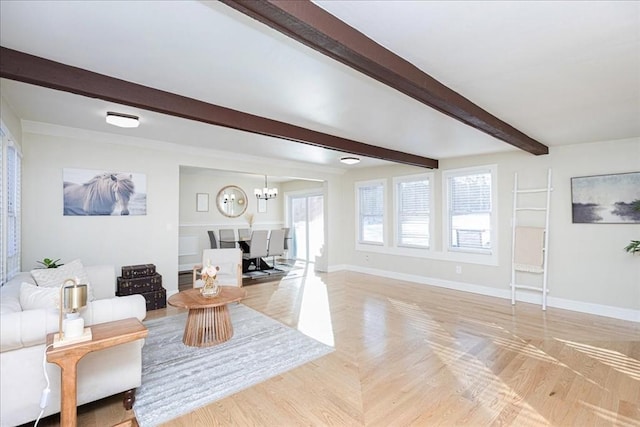 living room featuring beamed ceiling