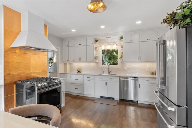 19 Franklin St, Wakefield, MA 01880 - kitchen with stainless steel appliances, custom exhaust hood, open shelves, white cabinetry, and recessed lighting