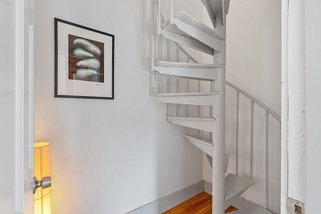 19 Franklin St, Wakefield, MA 01880 - staircase with wood finished floors and baseboards