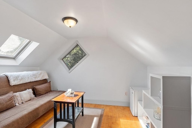 19 Franklin St, Wakefield, MA 01880 - bedroom featuring a skylight, light wood-style flooring, and lofted ceiling