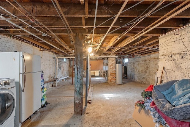 19 Franklin St, Wakefield, MA 01880 - basement featuring washer / clothes dryer, water heater, and freestanding refrigerator