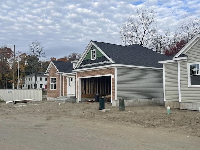 view of front of home featuring a garage