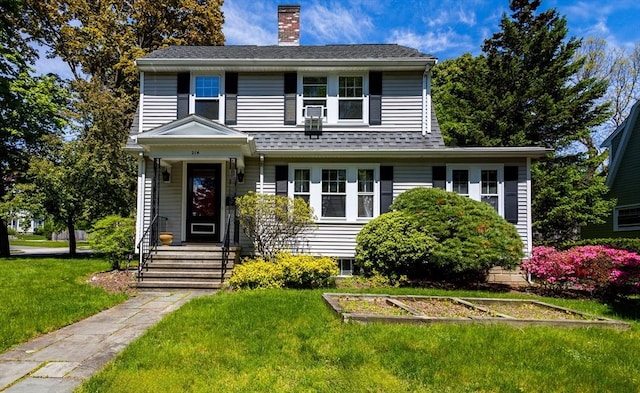 view of front of house with a front yard