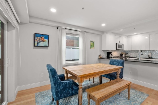 11 Cameron St Unit 1, Brookline, MA 02445 - dining room with light wood-type flooring, recessed lighting, and baseboards