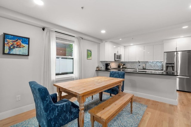 11 Cameron St Unit 1, Brookline, MA 02445 - dining room featuring light wood-style flooring, recessed lighting, and baseboards