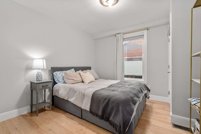 11 Cameron St Unit 1, Brookline, MA 02445 - bedroom with wood finished floors and baseboards