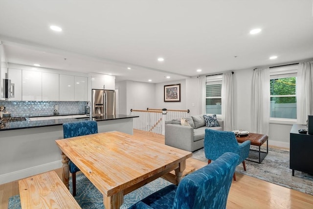 11 Cameron St Unit 1, Brookline, MA 02445 - dining area with light wood-type flooring, recessed lighting, and baseboards