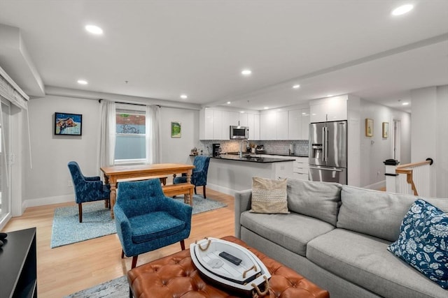 11 Cameron St Unit 1, Brookline, MA 02445 - living area featuring light wood-style floors, recessed lighting, and baseboards