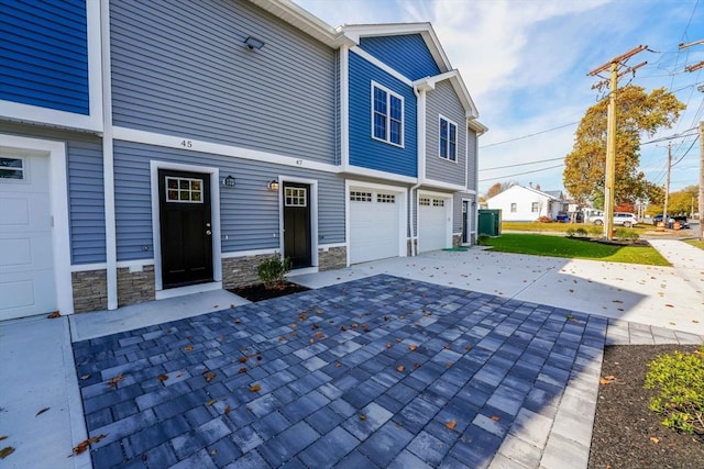 exterior space with a garage