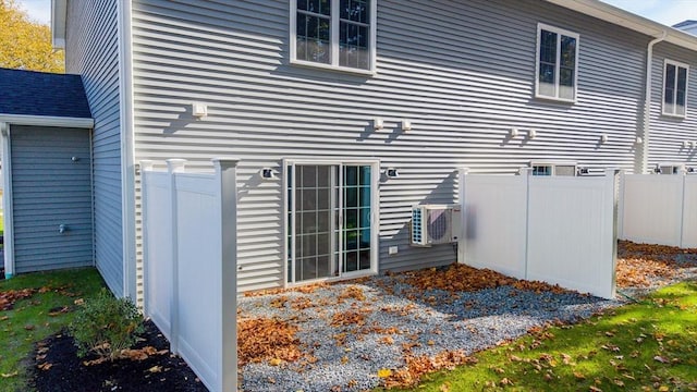 view of side of property featuring cooling unit