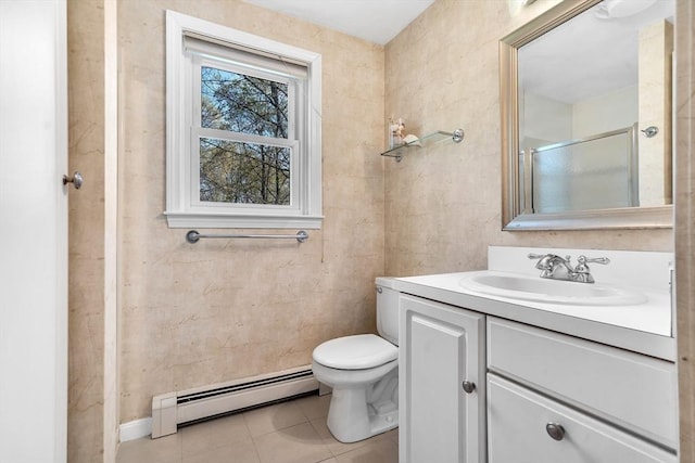 bathroom featuring vanity, toilet, an enclosed shower, tile patterned floors, and a baseboard radiator