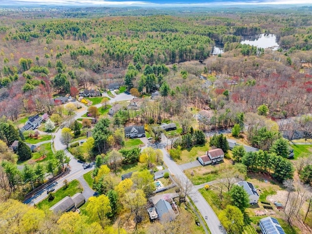 bird's eye view featuring a forest view