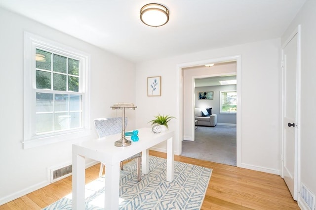 6 Macarthur Rd, Natick, MA 01760 - home office with plenty of natural light and light wood-type flooring