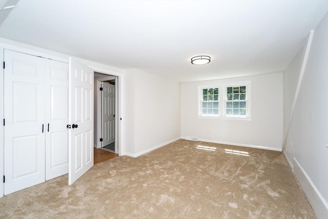 6 Macarthur Rd, Natick, MA 01760 - unfurnished bedroom with carpet floors and a closet