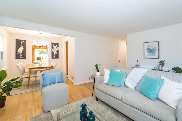 6 Macarthur Rd, Natick, MA 01760 - living room with light wood-style floors and baseboards
