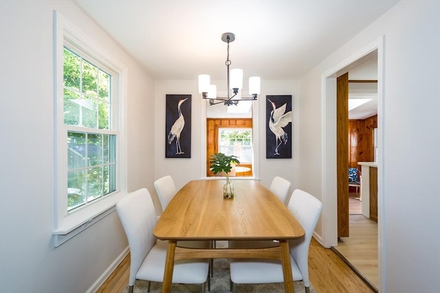 6 Macarthur Rd, Natick, MA 01760 - dining area with a chandelier and light wood-style floors